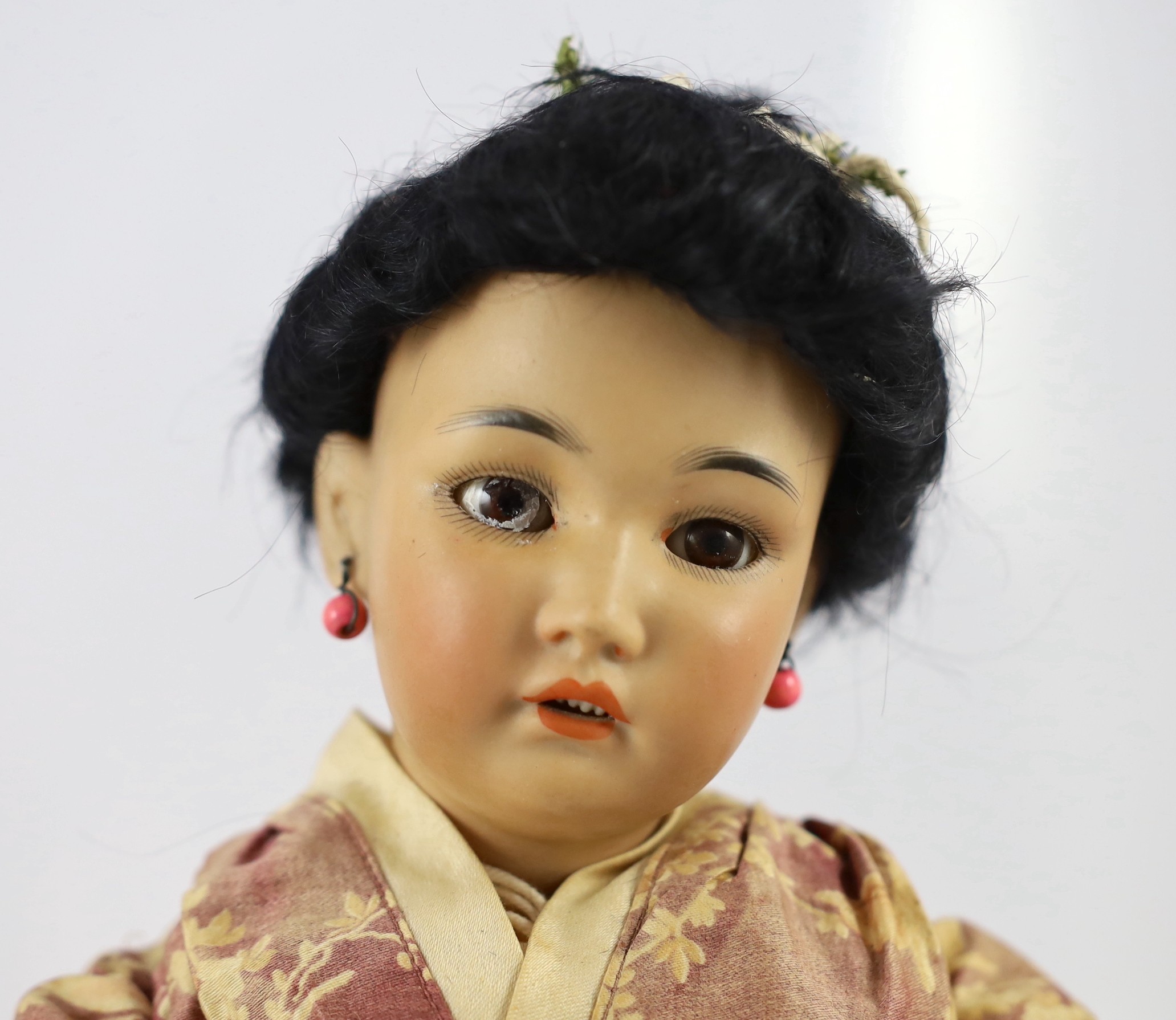 A Simon & Halbig bisque Oriental doll, German, circa 1910, 17.75in.